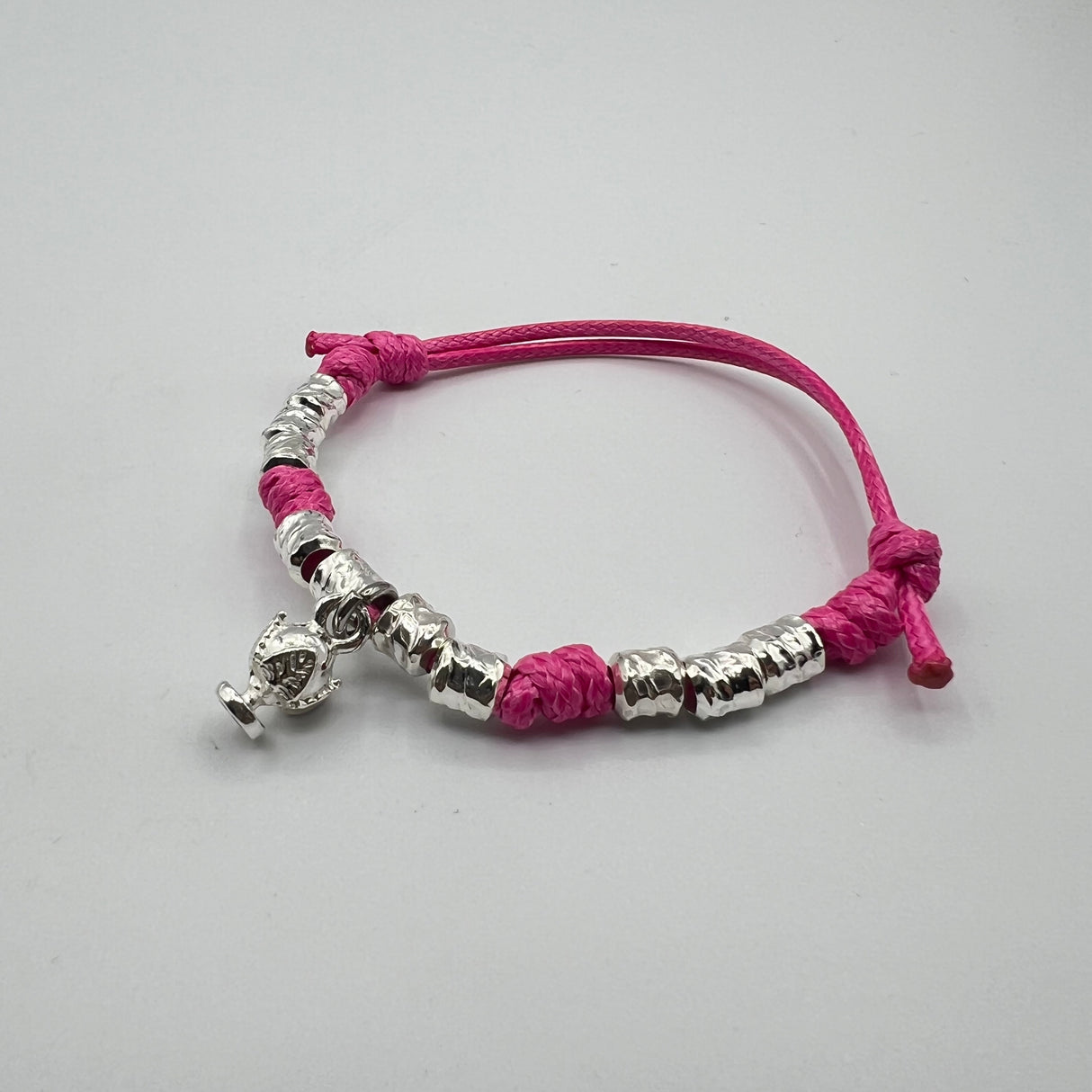 Bracciale cordino e Pumino Argento925 Fucsia