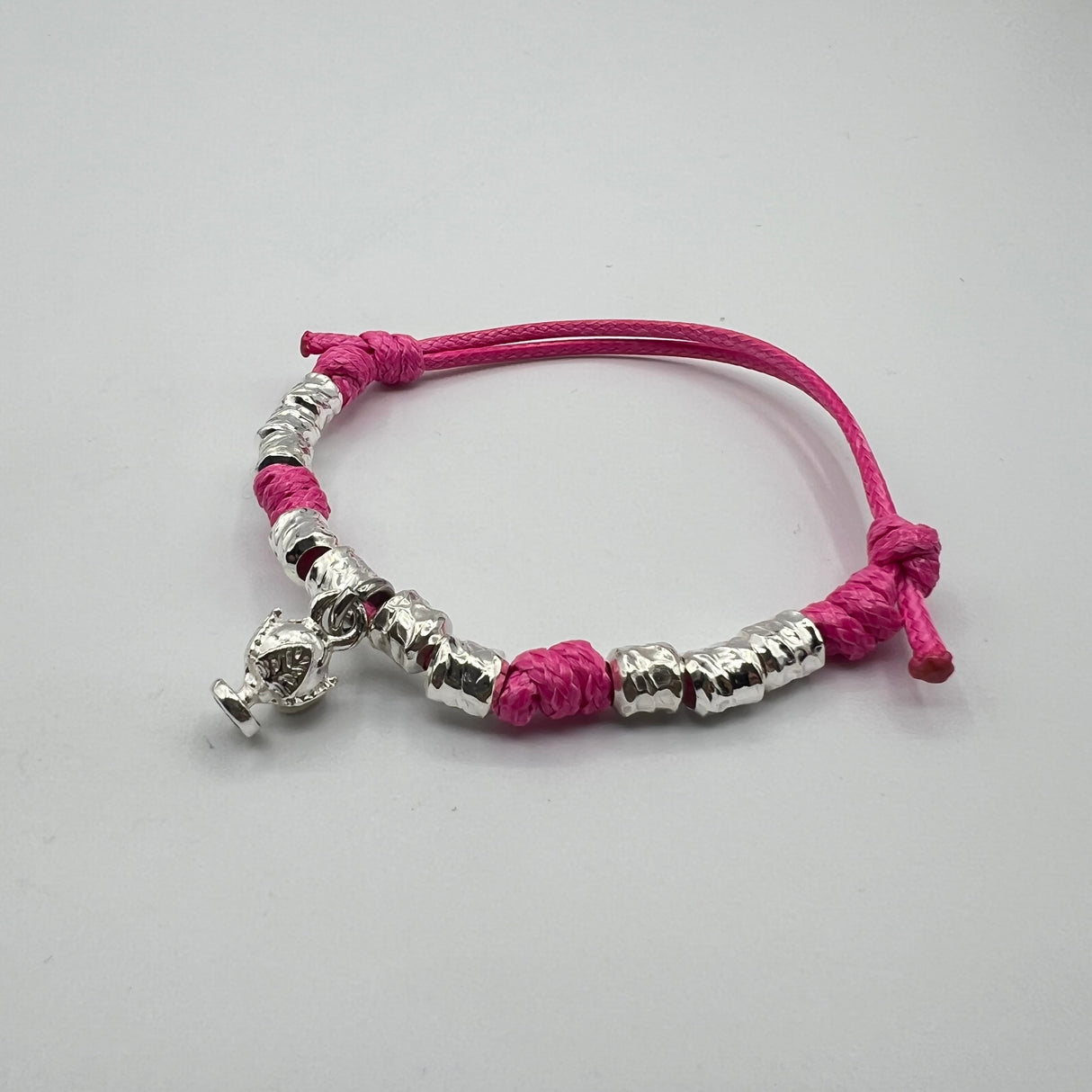 Bracciale cordino e Pumino Argento925 Fucsia